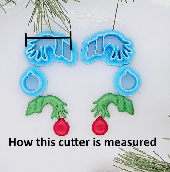 Grinch hand set polymer clay cutter for jewelry making and fondant cake decorating